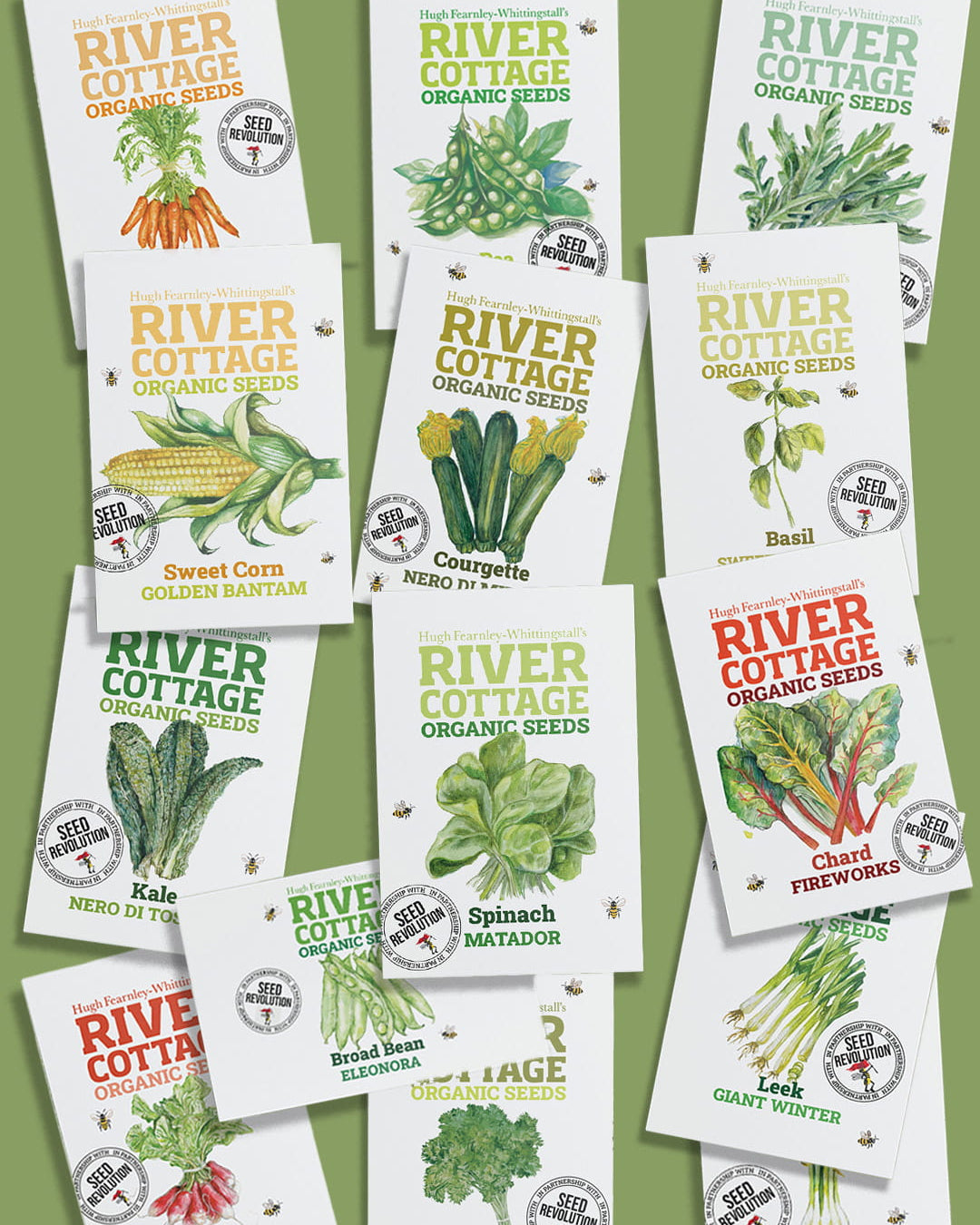 Collection of River Cottage Organic Veg Seeds packets for the Big Grower Bundle on a green background. Showcasing Seed Revolution's Veg Seeds, carrot seeds, broad bean seeds, radish seeds, beetroot seeds, spring onion seeds, kales seeds, chard seeds, pea seeds, parsley seeds, basil seeds, leek seeds, Sweet Corn seeds, vegetable seeds, organic seeds, seed for veggies, seeds veg, veg seed uk, organic seeds, organic vegetable seeds.