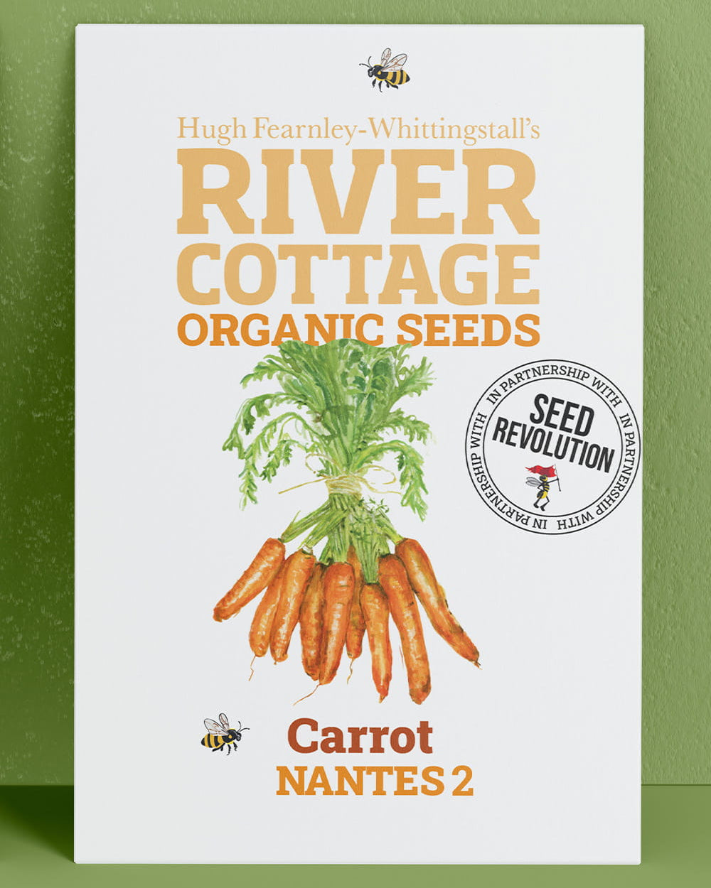 River Cottage Organic Seeds carrot packet on a green background. Showcasing Seed Revolution carrot seeds, seed carrots, carrots growing, vegetable seeds, organic seeds, seed for veggies, seeds veg, veg seed uk, organic seeds, organic vegetable seeds.