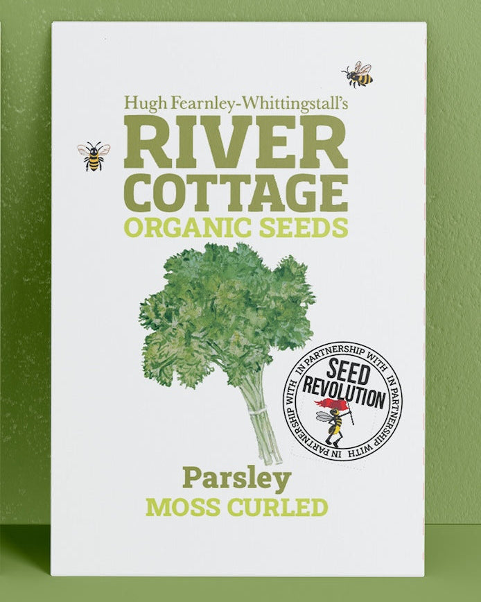 River Cottage Organic Seeds parsley packet on a green background. Showcasing Seed Revolution Parsley seed, Parsley seeds, Parsley herb, vegetable seeds, organic seeds, seed for veggies, seeds veg, veg seed uk, organic seeds, organic vegetable seeds.