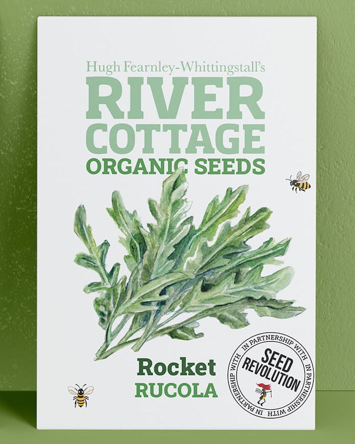 River Cottage Organic Seeds rocket packet on a green background. Showcasing Seed Revolution rocket seeds, rocket gardening, rocket vegetable, vegetable seeds, organic seeds, seed for veggies, seeds veg, veg seed uk, organic seeds, organic vegetable seeds.