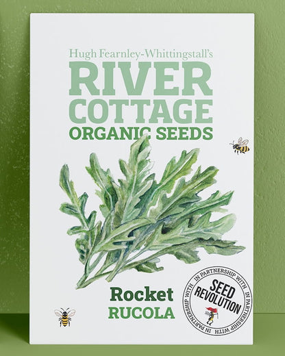 River Cottage Organic Seeds rocket packet on a green background. Showcasing Seed Revolution rocket seeds, rocket gardening, rocket vegetable, vegetable seeds, organic seeds, seed for veggies, seeds veg, veg seed uk, organic seeds, organic vegetable seeds.